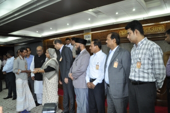 The Prime Minister handed over cheques of Tk 7 lakh to each Tazreen Fashions fire victim